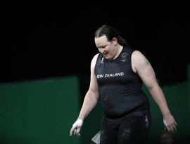 93432371_New-Zealands-Laurel-Hubbard-walks-into-the-arena-to-compete-during-the-womens-90kg-weigh